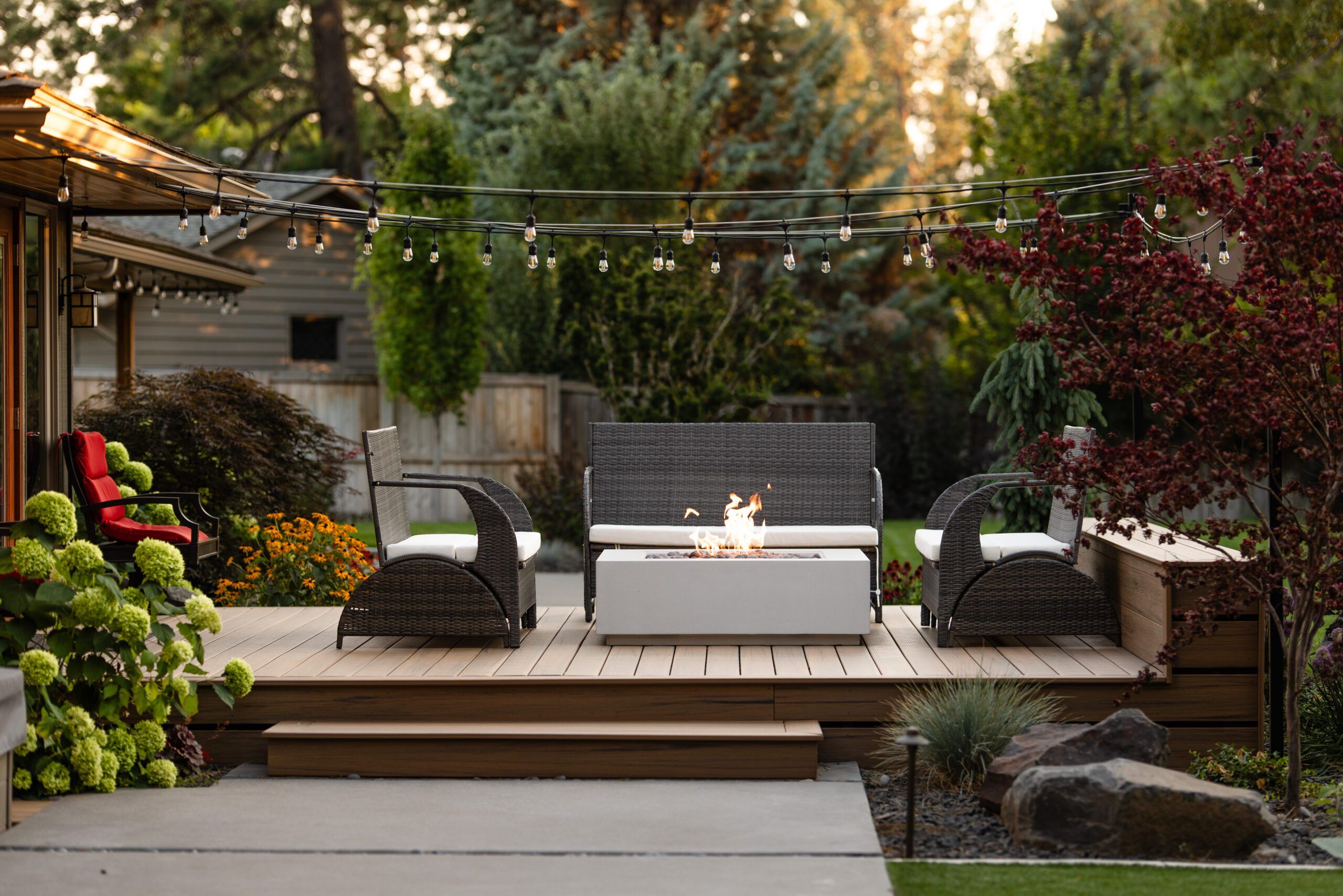A complete backyard outdoor living project in Spokane including custom deck and fire feature