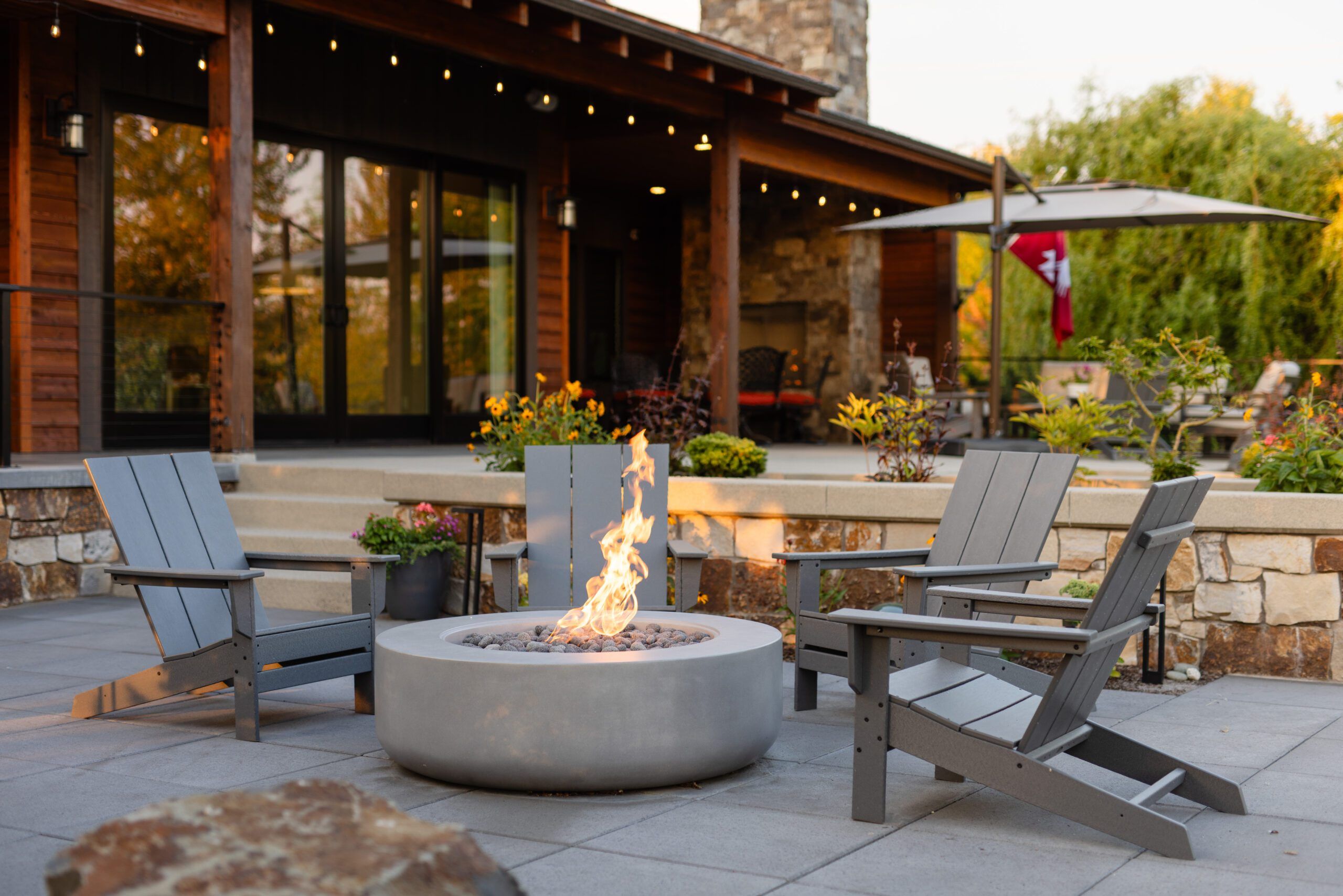 Top Hardscaping Spokane Ideas for Your Outdoor Space Are you looking to transform your Spokane outdoor space with hardscaping Spokane? This article offers top ideas and detailed insights into everything from patios and retaining walls to outdoor kitchens and lighting. Read on to discover how hardscaping can enhance both the beauty and functionality of your yard. Key Takeaways Hardscaping includes non-plant elements like patios, walkways, and retaining walls, providing structure and preventing soil erosion. Custom hardscape design involves an initial consultation, property survey, and collaboration with clients to ensure their vision is met. Incorporating elements like outdoor kitchens and water features enhances the functionality and aesthetic appeal of outdoor spaces while considering sustainability. Understanding Hardscaping