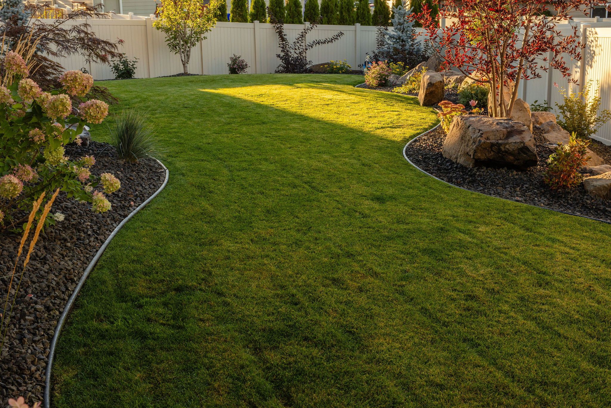 Sod and artificial turf landscape by Copper Creek Landscaping