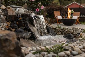 Sandpoint Idaho small backyard water feature and firepit