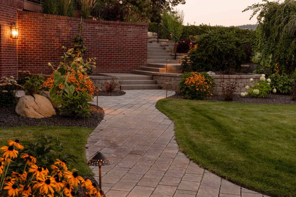 Spokane outdoor space designed with patios, planting, and lighting