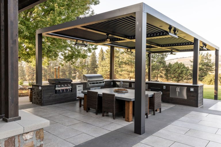 Outdoor kitchen and deck project by Copper Creek Landscaping